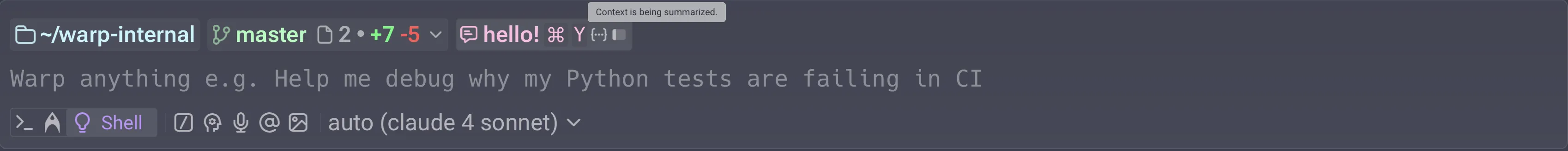 Context window indicator after Warp automatically summarizes the conversation to free up space.